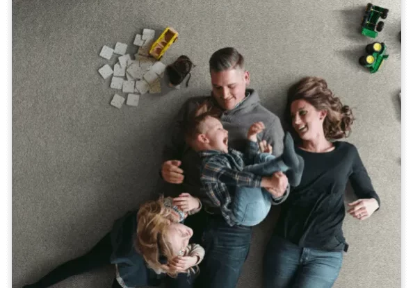 Family Enjoying New Carpet Flooring | Kay Riley Flooring and Design